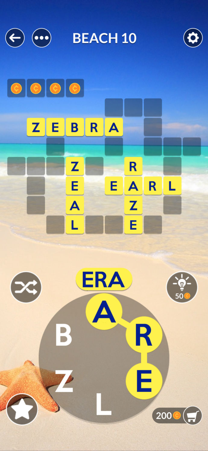 Captura de pantalla del juego Wordscapes en la fase 'Beach 10' con un fondo de playa y cielo azul. Hay un rompecabezas de palabras con casillas amarillas que forman las palabras ZEBRA, ZEAL y otras parcialmente completadas. Un menú en la parte inferior muestra letras en círculos para ser usadas, y en la esquina, una estrella de mar adorna la imagen.
